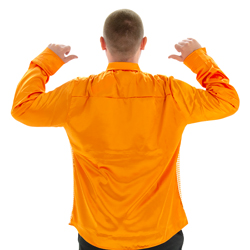 A model wearing Orange 70s Disco Shirt, facing away from the camera pointing at his back.