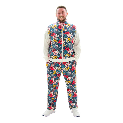 Model posing in Flower Print Tracksuit, facing the camera with his hands in his pockets.