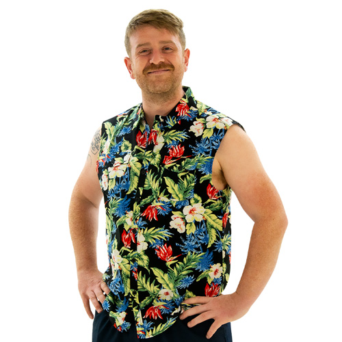 A model wearing Sleeveless Freesia Shirt, smiling and facing the camera with his hands on his hips.
