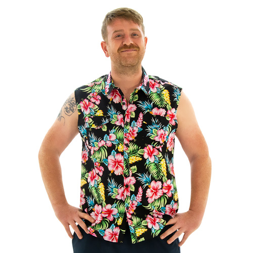 A model wearing Sleeveless Hibiscus Shirt, smiling and facing the camera with his hands on his hips.