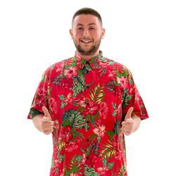 A model wearing Coral Pink Hawaiian Shirt, facing the camera and giving a thumbs up.