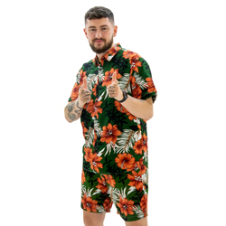 Model wearing Khaki Green Hawaiian Shirt and Shorts, pointing towards the camera and smiling.