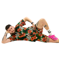 Model wearing Khaki Green Hawaiian Shirt and Shorts, laying on the floor.
