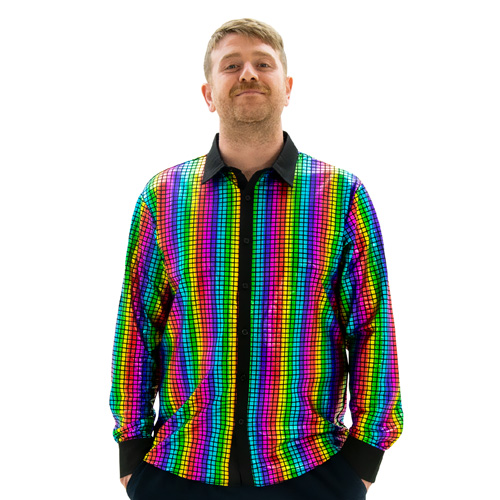 A model wearing Multicolour 70s Disco Shirt, facing the camera with his hands in his pockets.