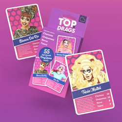 Top Drags card game and cards on a pink background.