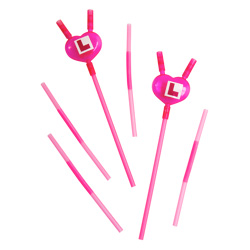 Curly heart straws isolated on a white background.