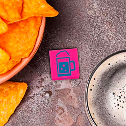 Drinking dice on a pub table.