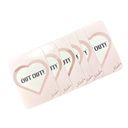 A few Out Out cards laid out on a white background.