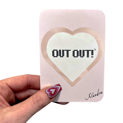 Hand holding Out Out card isolated on a white background.