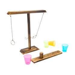 Ring Toss game and colourful shot glasses isolated on white background