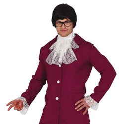 Close up of a man wearing Austin Powers costume on a white background