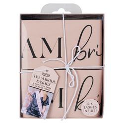 A pink team bride sash in a box