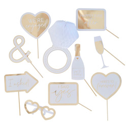A pack of engagement props against a white background