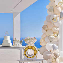 Engagement party props at a venue outside by the sea