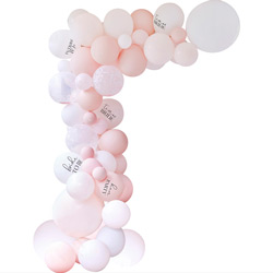 A team bride balloon arch with streamers against a white background