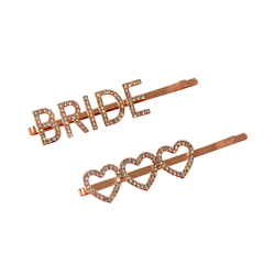 Rose gold bride hair slides on a white background