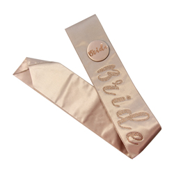 Rose Gold bride sash and badge on a white background