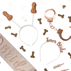 A flatlay of rose gold hen party accessories isolated on a white background