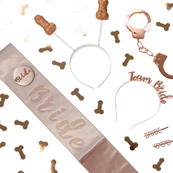 A flatlay of rose gold hen party accessories isolated on a white background