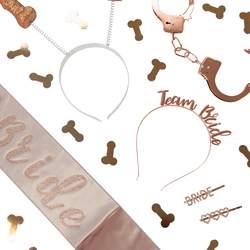 A flatlay of rose gold hen party accessories isolated on a white background