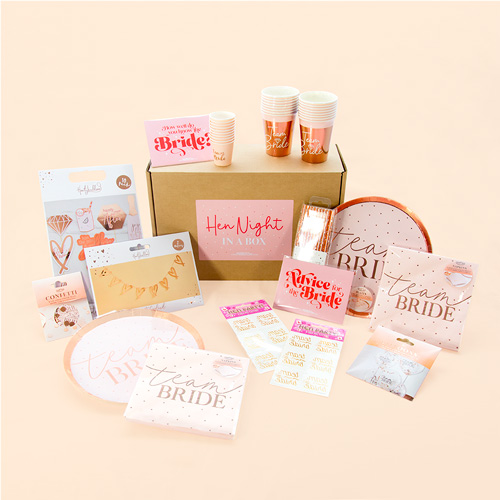 Contents of Last Night of Freedom's Team Bride Hen Do in a Box on a peach background
