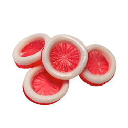 A pile of Gummy Condoms on a white background