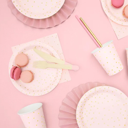 Pink Polkadot napkin flatlay on pink background with other cutlery items