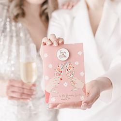 Bride holding Team Bride Enamel Pin with Card