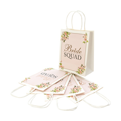Bride Squad Floral gift bags laid out on a white background