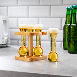 Mini Yards of Ale filled with beer on a kitchen bench