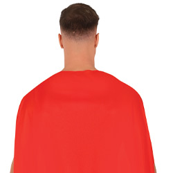 The back of a male model wearing a super hero style stag do costume with a red cape