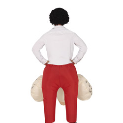 A back view of a male model wearing an inflatable cock and balls that's bursting from out of his red trousers which he is wearing with a white shirt and black wig 