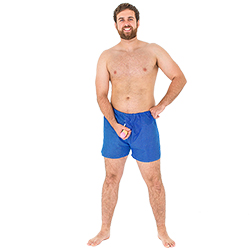 A model wearing the shorts and holding the feature