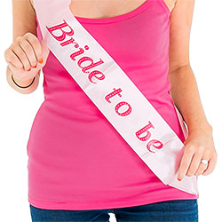 A model wearing the sash and smiling