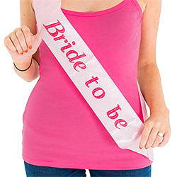 Light pink sash against a hot pink vest top