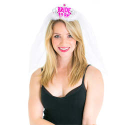 Bright pink writing on a white tiara