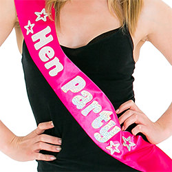 Bright pink material with shiny silver text