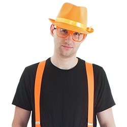 A model wears the glasses with a hat and braces