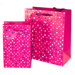 The pink spotted bag comes in two sizes