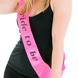 The hot pink sash looks great with a black vest top