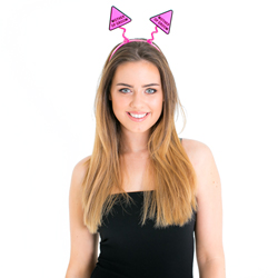 Looking straight forwards with the boppers on her head