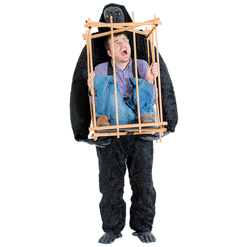 Man wearing the man in a cage with gorilla costume, looking frightened