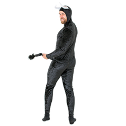 A shot of the model from the side wearing the bull costume and holding his tail whilst winking