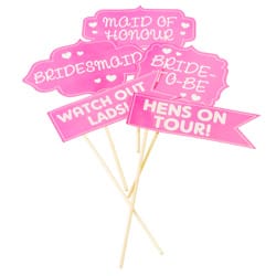 Hen party props with slogans on, lying out together