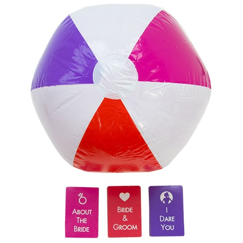 An inflated ball and some playing cards 
