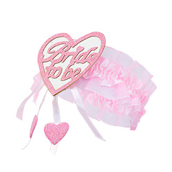 Bride to Be pink heart on a garter taken from the side