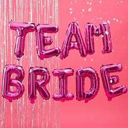 The 16 inch high balloons spell out Team Bride