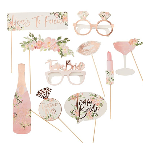 A pack of ten photo props, all with a floral and rose gold theme.