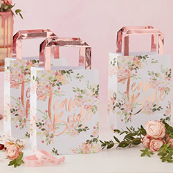 A pack of five floral team bride gifts bags.
