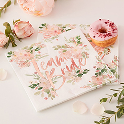 The napkin seen in use with a small doughnut.